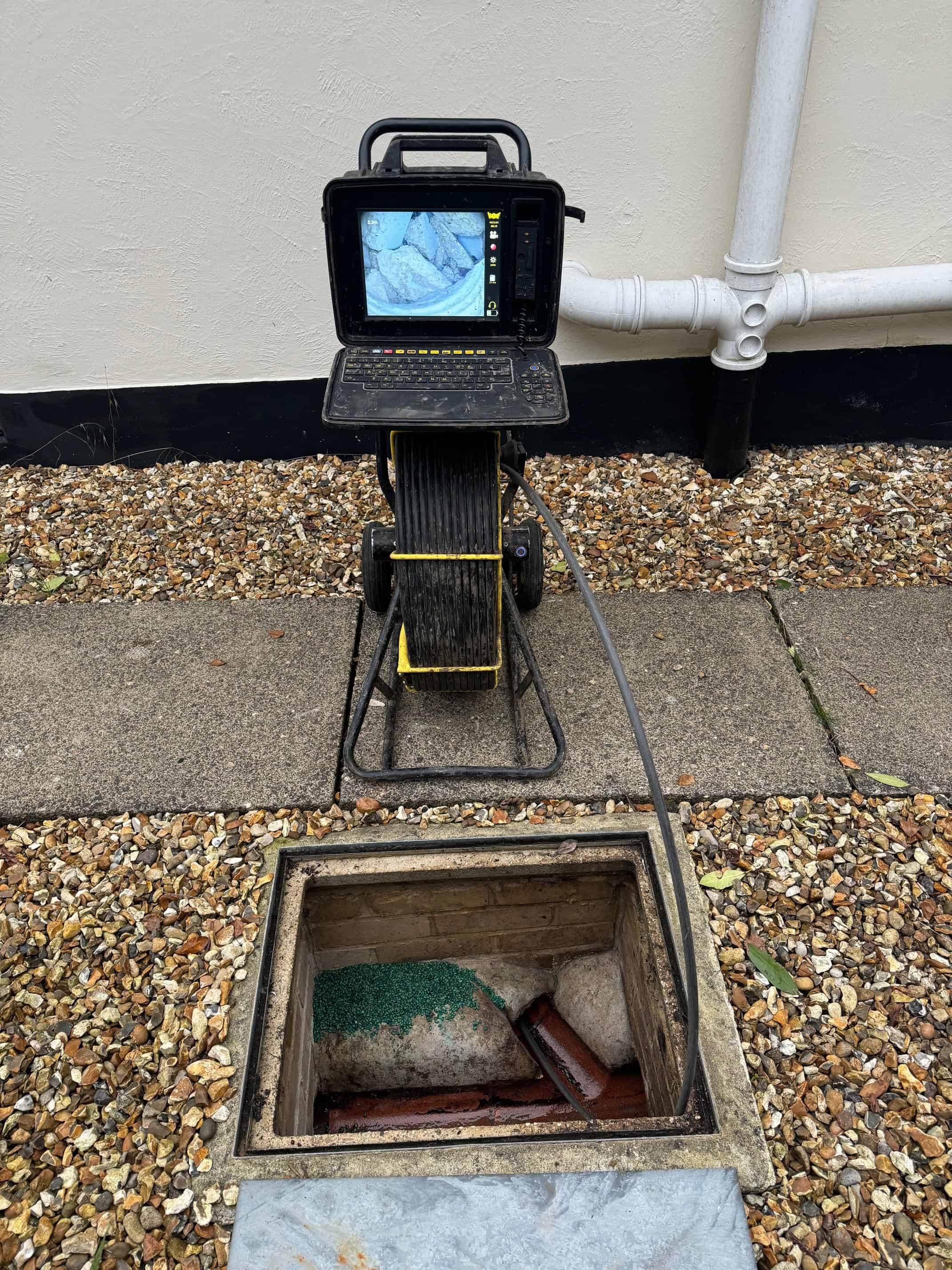 Drain inspection camera used to identify rodent entry points and blockages in drainage systems.